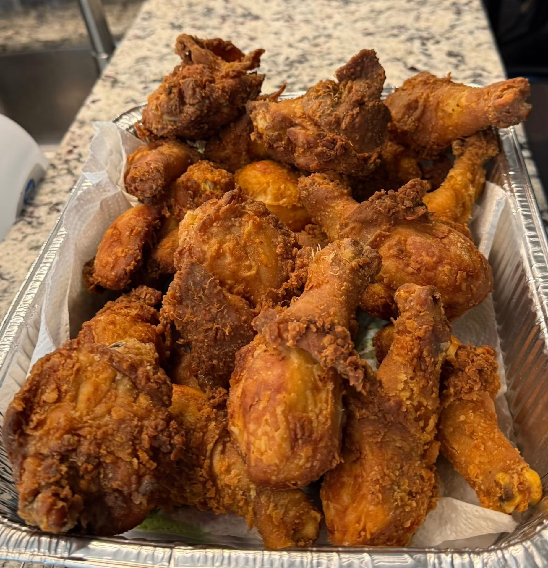 Catering pan of golden fried chicken