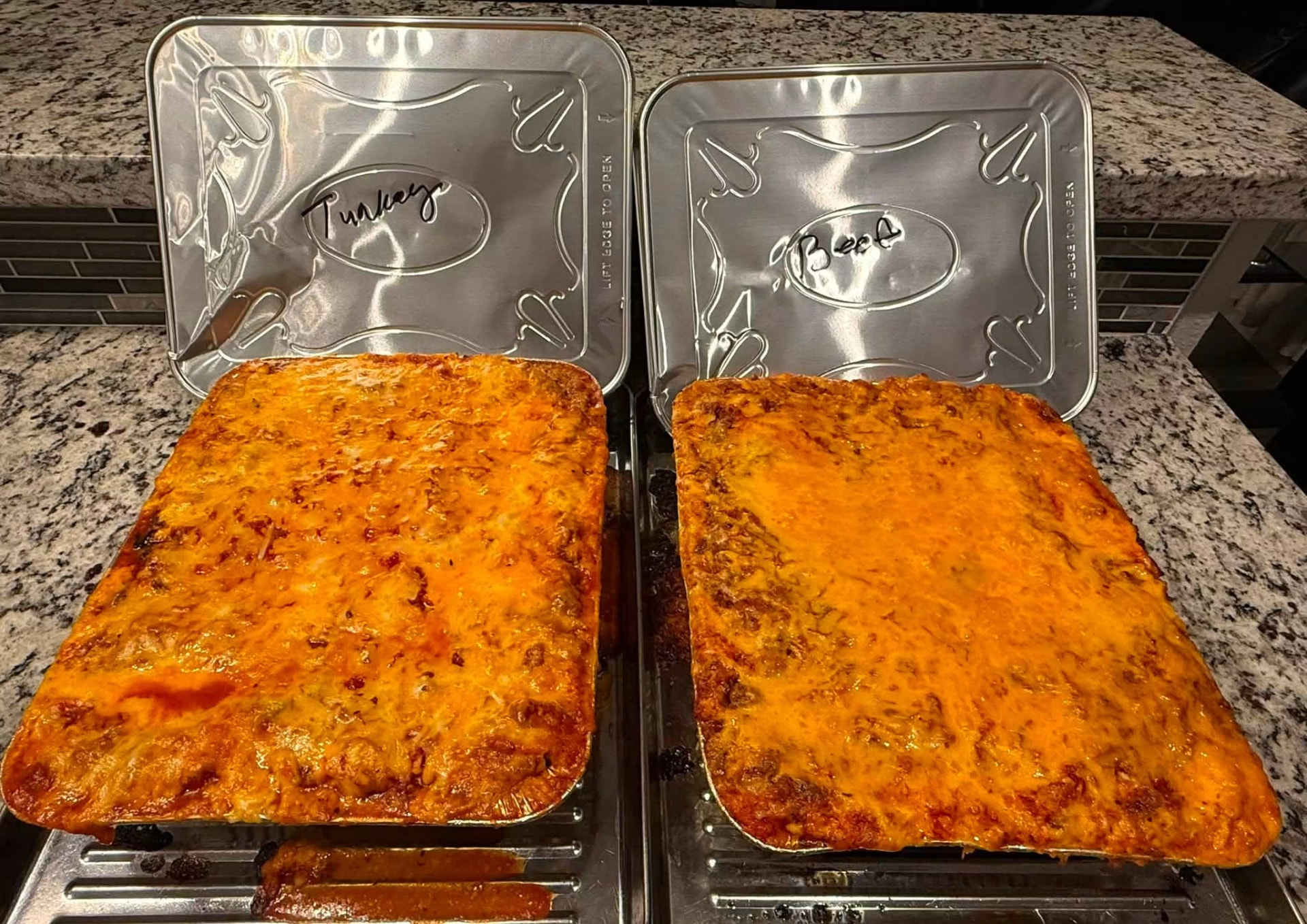 Full pans of turkey and beef lasagna