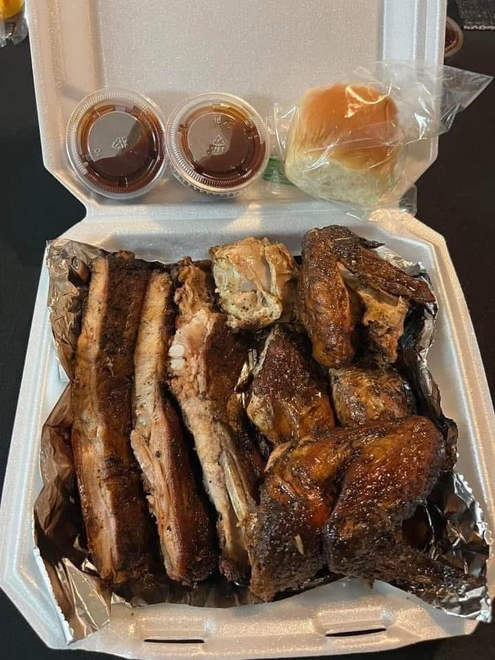 Barbeque platter of ribs, chicken and wings for a Houston party