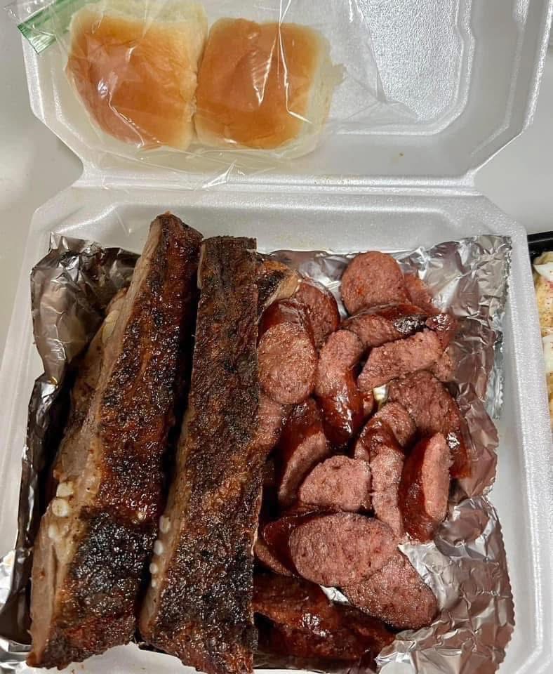 Smoked ribs and sausage catered for a Houston celebration
